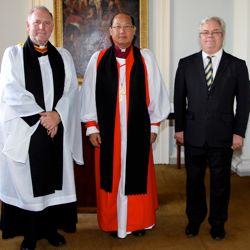 The Revd Adrian Empey, Archbishop of Hong Kong, the Most Revd Dr Paul Kwong and Dr Kerry Houston of DUFEM in Trinity College Dublin Chapel before Evensong.